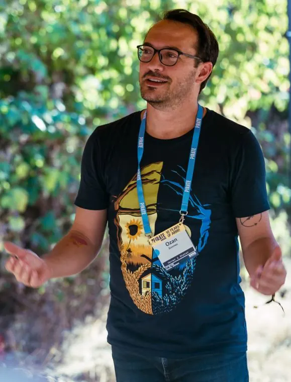 Ozan Sonmez on stage at Pirate Summit